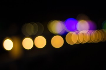 Wall Mural - Abstract circular bokeh background of lights in the night