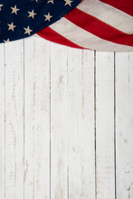 White Wooden Background With An American Flag