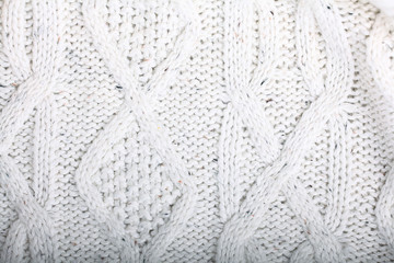 texture of white wool knit sweater homemade