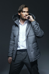 Wall Mural - Handsome man wearing Winter Jacket