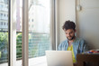 © Eugenio Marongiu - handsome hipster modern man working home using laptop