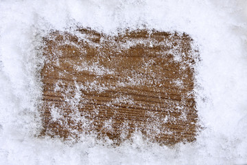 wooden background with snow framing