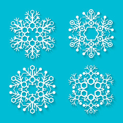 Wall Mural - vector flat white snowflakes set with shadows on blue background