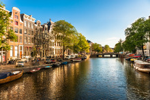 Houses And Boats On Amsterdam Canal