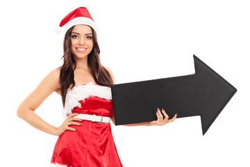 Sticker - Woman in Santa costume holding an arrow pointing right