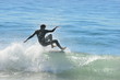 A Surfer at Malibu Beach, California