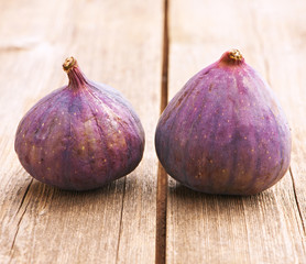 Wall Mural - Fresh figs on wooden table