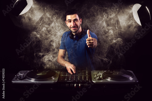 Deejay mixing at party Wallpaper Mural