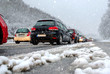 canvas print picture - Pendler Stau auf Autobahn Winter Schneefall Schneematsch
