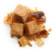 Brown cane sugar cubes and caramelized sugar