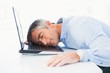 © WavebreakmediaMicro - Man with grey hair sleeping on his laptop
