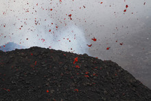 Mount Etna Produces Fountain Of Lava And Ash During Continued Er