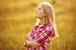 © dimedrol68 - Beautiful blond girl in shirt looking up