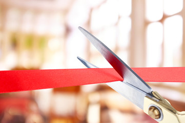 Grand opening, cutting red ribbon