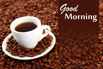 Cup of coffee on coffee beans background