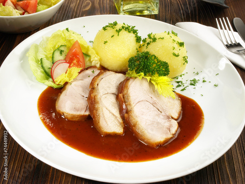 Schweinebraten mit Kartoffelknödel – Stock-Foto | Adobe Stock