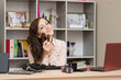 © madhourse - Girl in the office with brushes for make-up