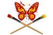 Yellow and red painted butterfly hover above two paintbrushes