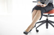 © Monet - Woman sitting in a chair, have a cell phone