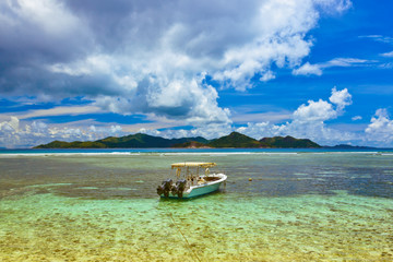 Wall Mural - Tropical island at Seychelles and boats