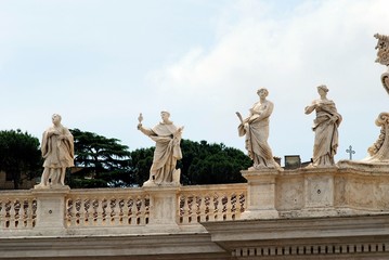 Wall Mural - Sculptures on the facade of Vatican city works