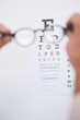 © WavebreakMediaMicro - Reading glasses looking at eye test