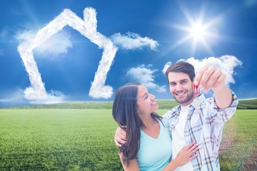 Poster - Composite image of happy young couple showing new house key