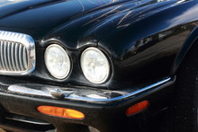 Black Car Bonnet And Round  Headlights Jaguar Automobile