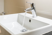 Washbasin And Faucet With Water Drop