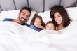 © Trendsetter Images - Family in bed