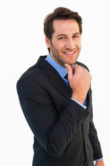 Poster - Businessman touching his chin while smiling at camera