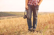 © arthurhidden - Young Man with retro photo camera outdoor hipster Lifestyle