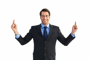 Poster - Smiling businessman pointing with both fingers