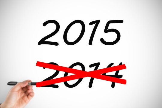 Composite image of businesswomans hand writing with marker