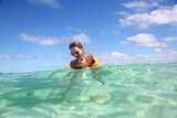 Fototapeta Na ścianę - Mother and daughter swimming in Caribbean sea