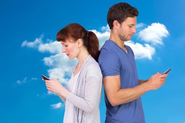 Aufkleber - Composite image of couple both sending text messages