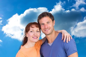 Poster - Composite image of couple looking at the camera