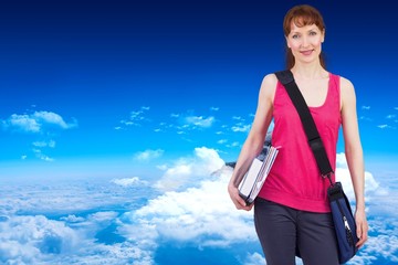 Aufkleber - Composite image of woman holding her school notebooks