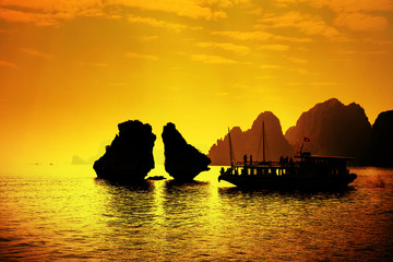 Halong Bay in sunset, Vietnam. Unesco World Heritage Site.