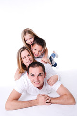 Wall Mural - isolated studio shot of happy family on white background