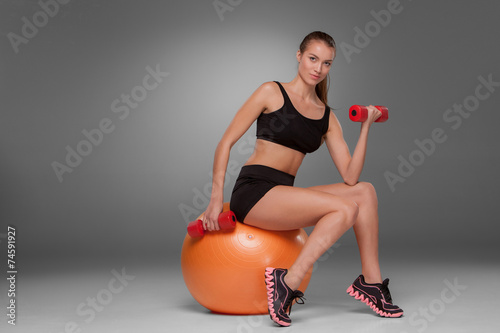 Naklejka nad blat kuchenny Sporty woman doing aerobic exercise