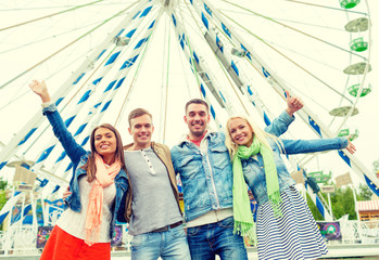 Canvas Print - group of smiling friends waving hands