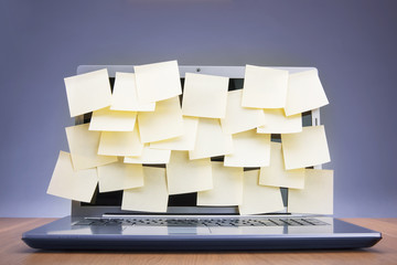 post-its attached to laptop
