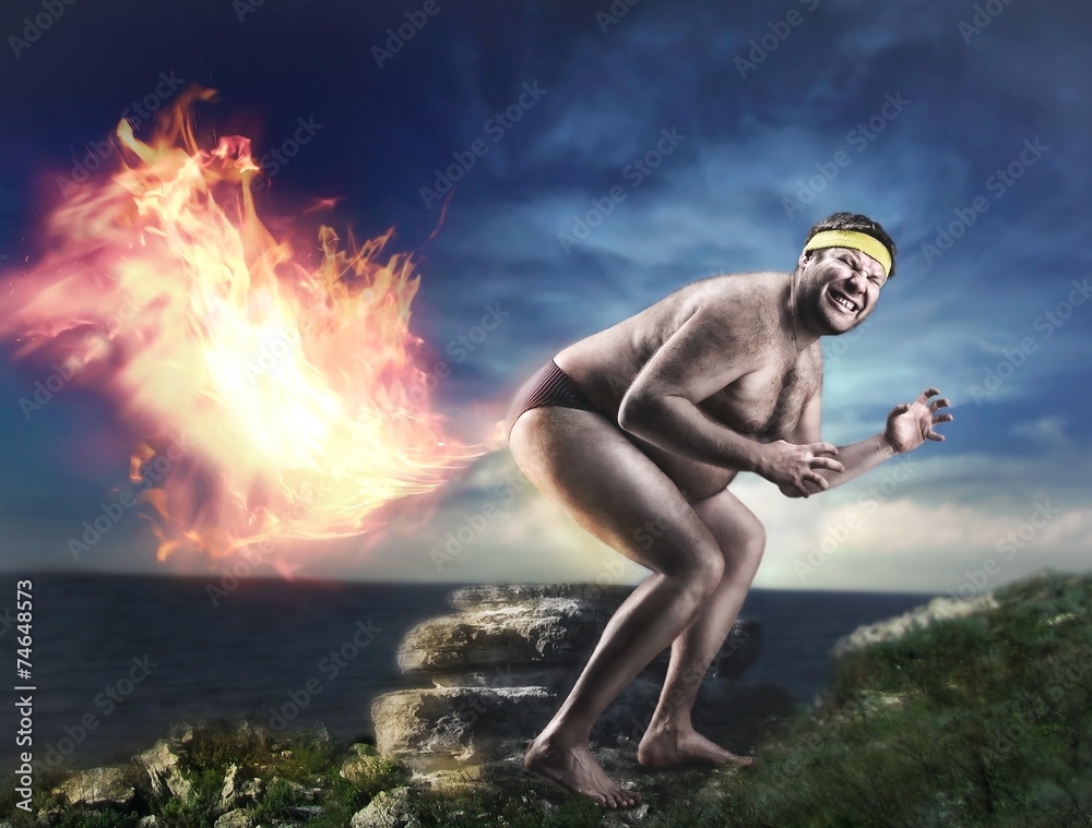 Bizarre naked man farts flame