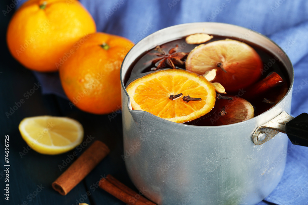 Old metal pan of tasty mulled wine