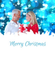 Aufkleber - Composite image of loving couple with gift