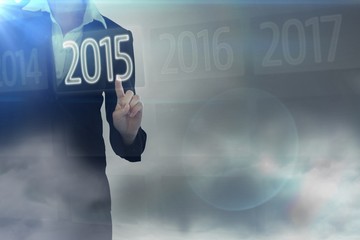 Aufkleber - Composite image of businesswoman pointing somewhere