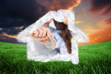 Poster - Man and wife presenting a key with a house keychain