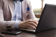 © lukafunduck - Businessman typing on lap top
