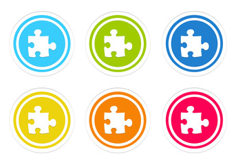 Wall Mural - set of rounded colorful buttons with puzzle symbol